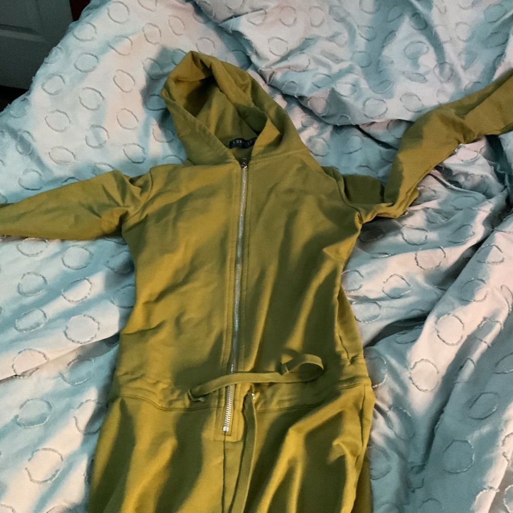 size S romper has small non noticeable rip on draw string
